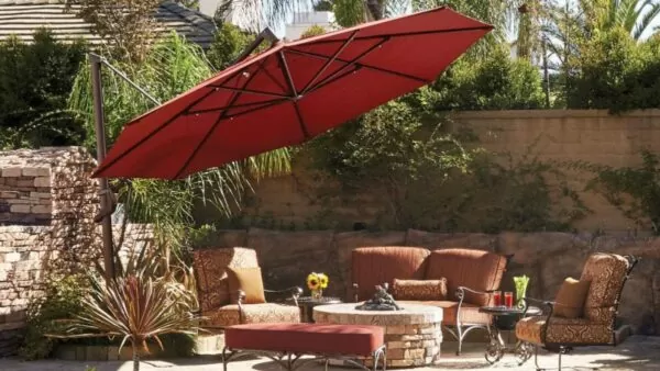 Our most popular cantilever umbrella: the AKZ Plus Octagon Umbrella by Treasure Garden, with full auto-tilt features perfect for catching shade while relaxing in your patio loveseat.