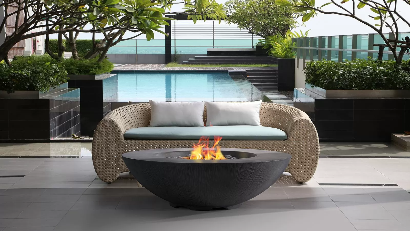 The Shangri La firepit by Pyromania is a great addition to any relaxing poolside.