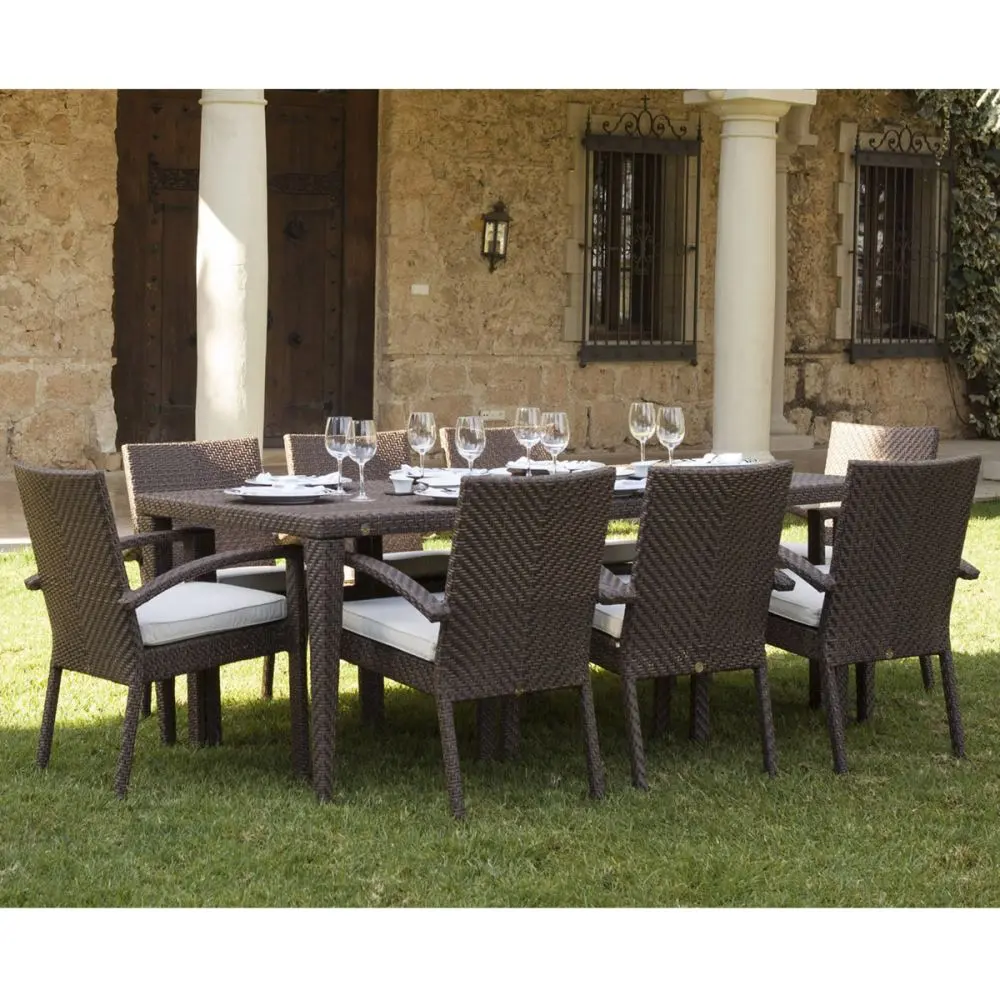 The Soho cushioned patio dining set by Hospitality Rattan - an elegant way to make a nice lawn pop!