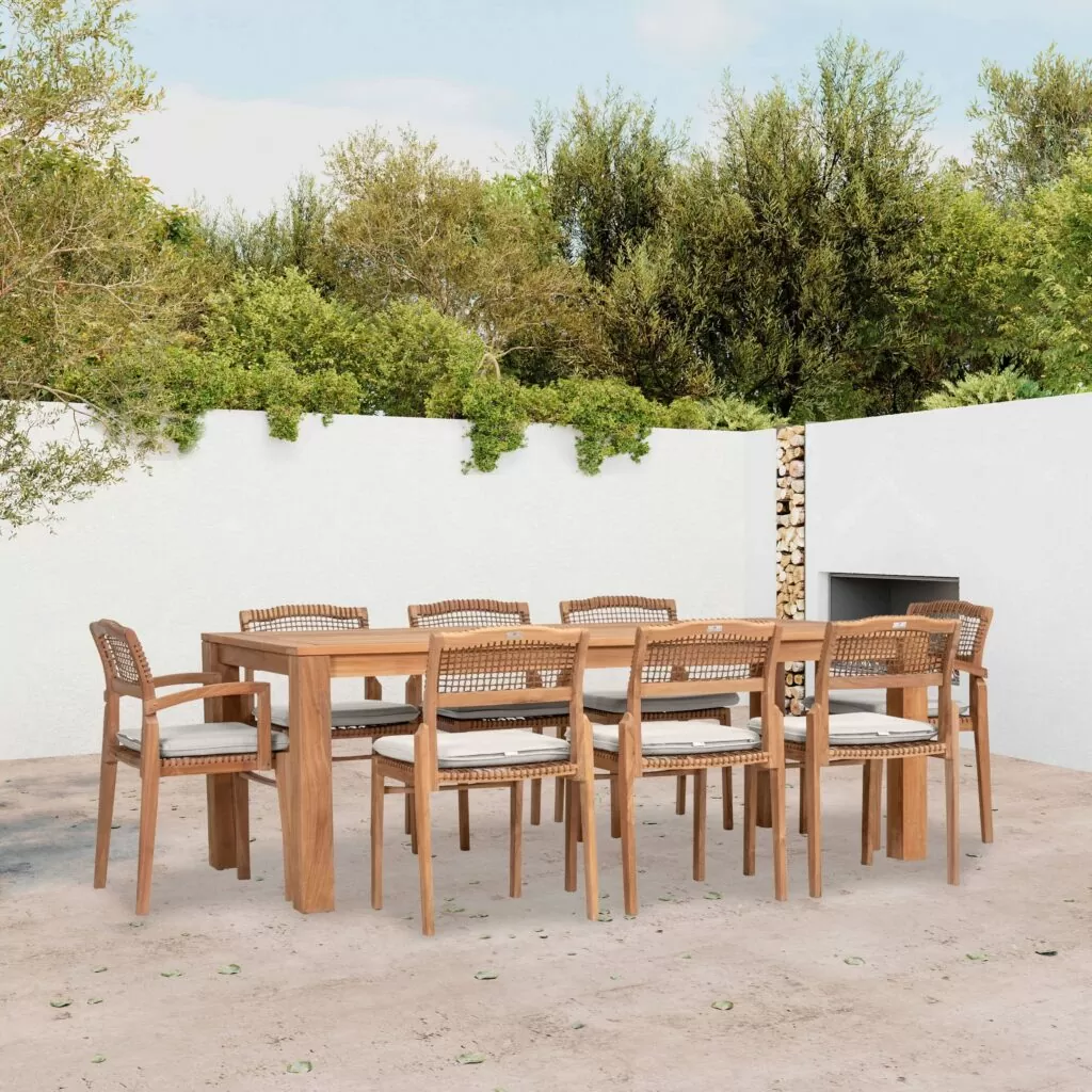 A teak outdoor dining set with wicker weave accents looks stylish and fresh on a clean modern patio